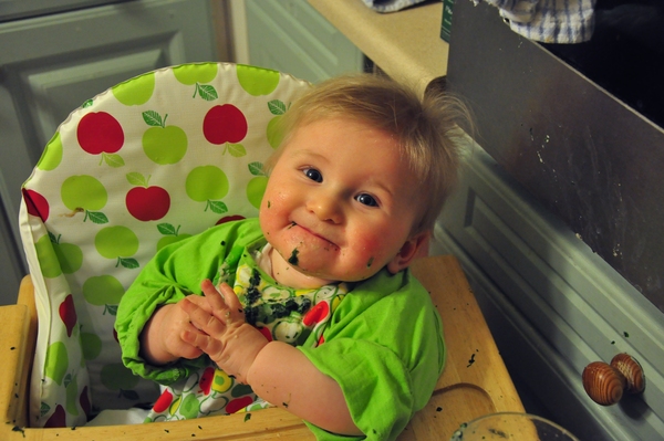 Baby smiling about spinach